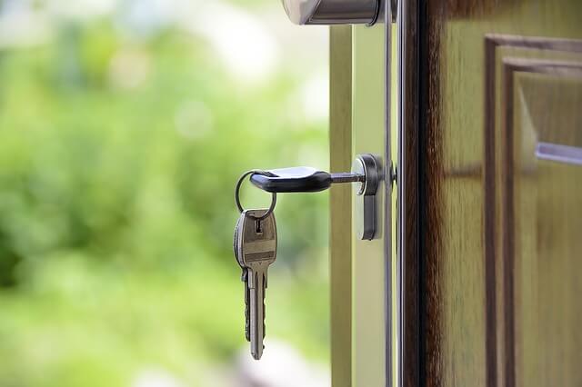 Image of key in door - New Generation Development